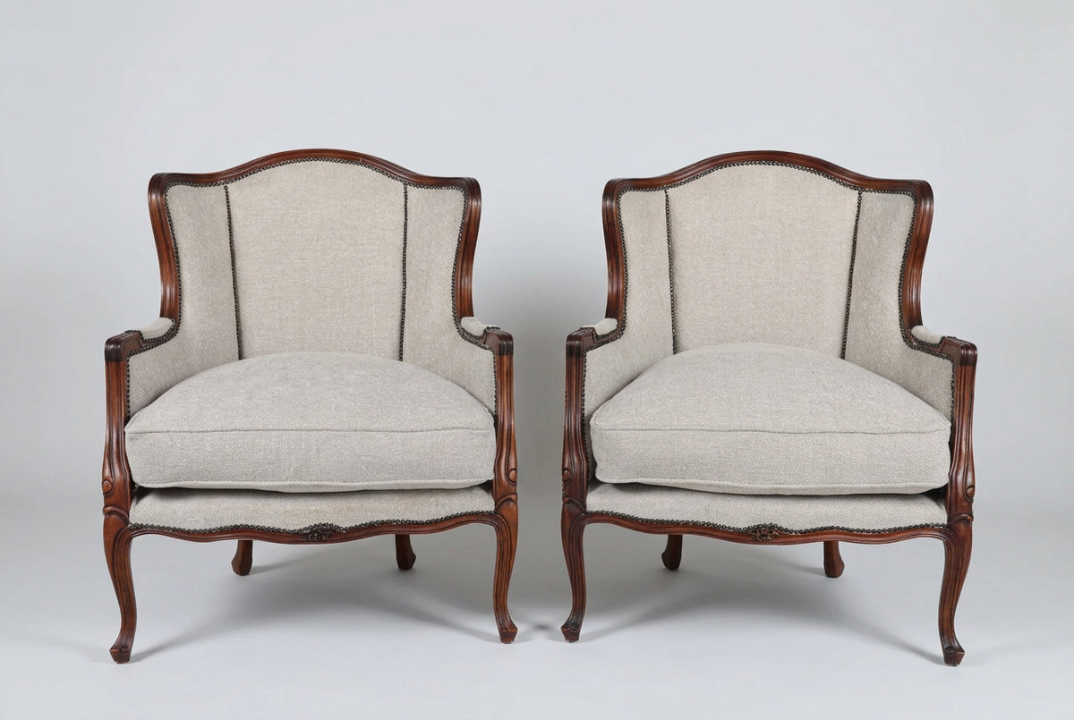 Stunning pair of Griffiths & Griffiths French Louis XV style wingback Bergères