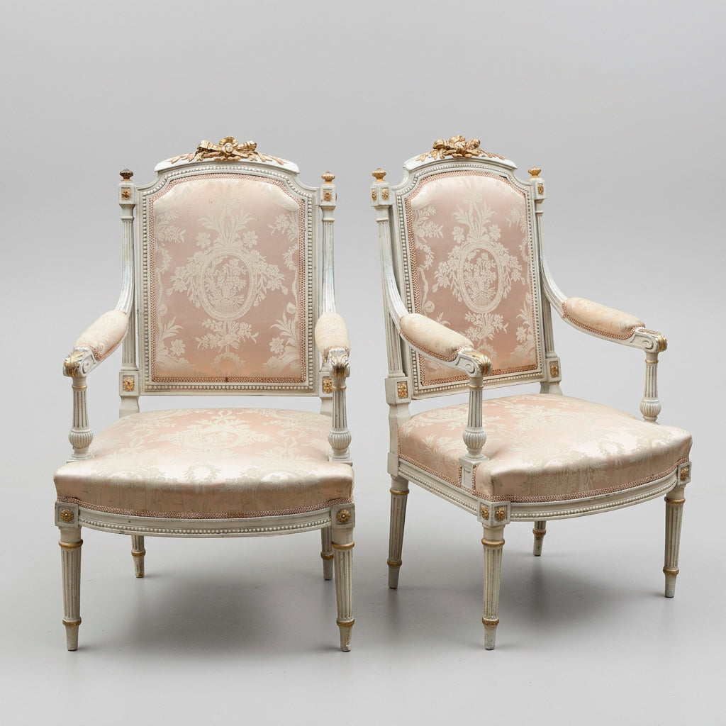 Beautiful pair of Louis XVI style carved and parcel-gilt Armchairs/Fauteuils