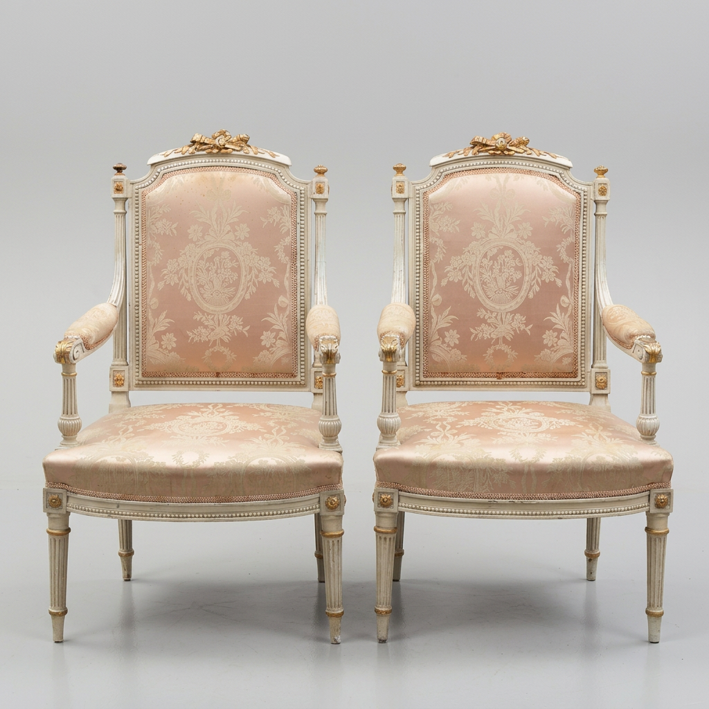 Beautiful pair of Louis XVI style carved and parcel-gilt Armchairs/Fauteuils