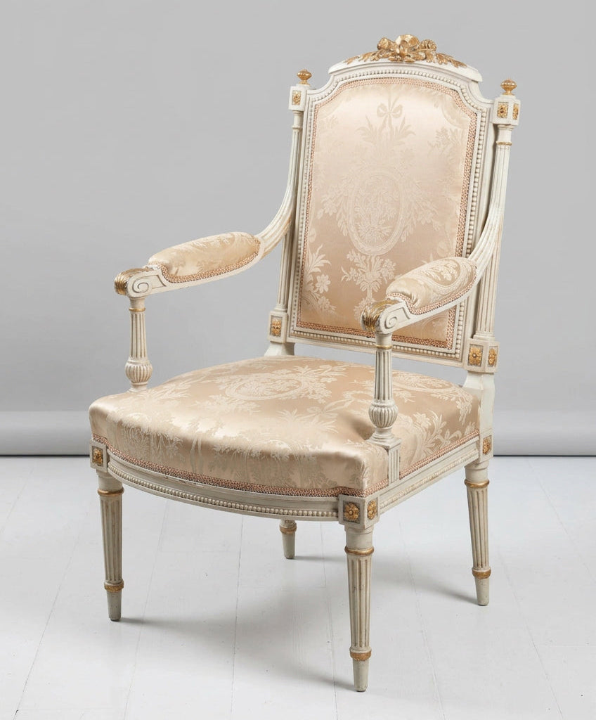 Beautiful pair of Louis XVI style carved and parcel-gilt Armchairs/Fauteuils