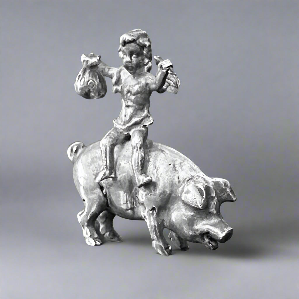 A Miniature silver Pig with a Fairy Rider